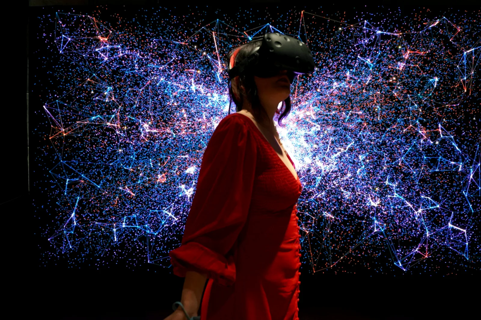 A person using a virtual reality product in an immersive LED installation